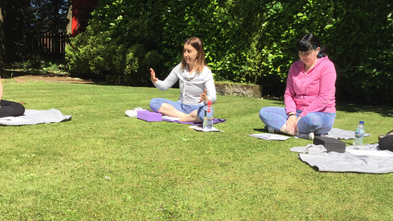 Yoga by Gillian teaching yoga outside