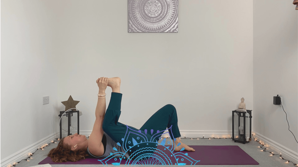 half happy baby yin yoga pose for better sleep